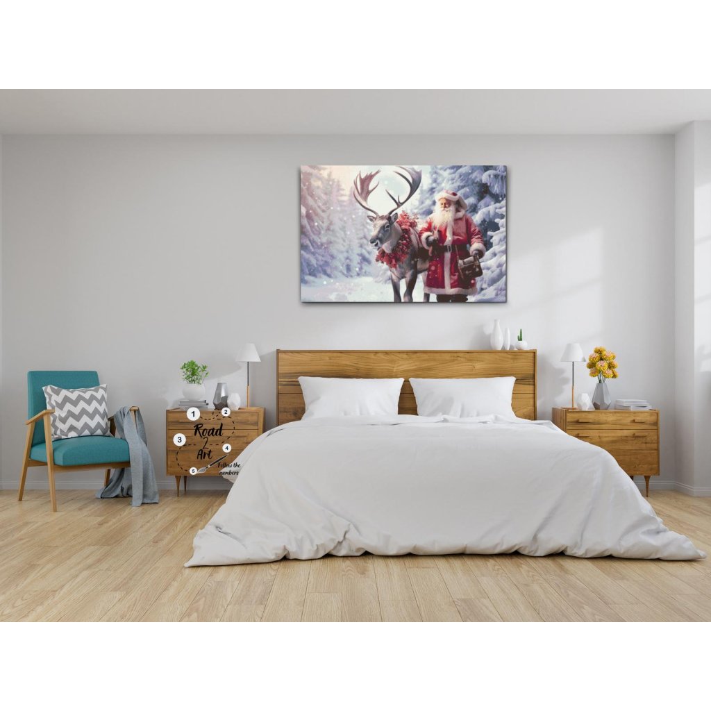 julmotiv med tomte och ren i vinterlandskap